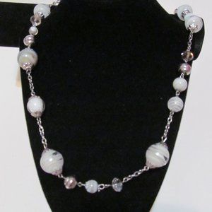 Silver tone large white glass beads swirl design long necklace